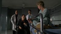 Adrian Conrad erklärt Samantha Carter den Grund für ihre Entführung in das Saint Christina's Hospital.